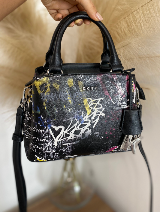 DKNY Barrel bag repeated print all over the surface